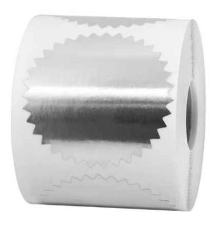 Silver embosser sticker paired with personalized seal for luxury packaging