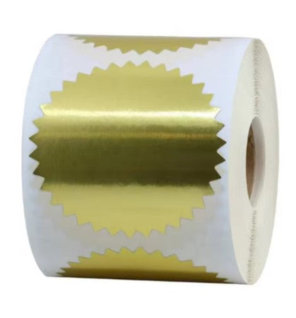 Gold foil label sticker used with custom library embosser on bookplate