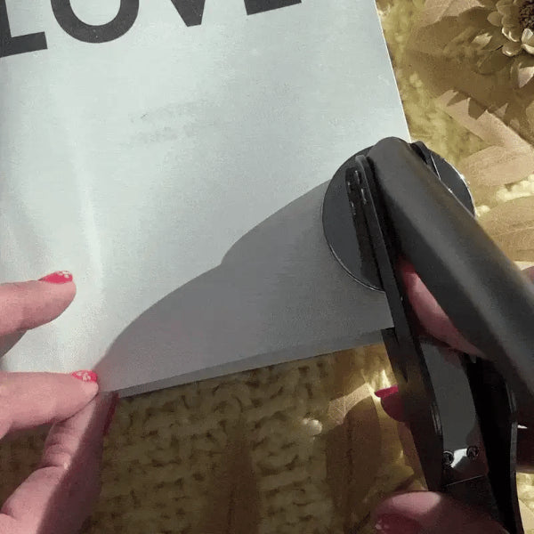 Custom Seal Embosser – Cat Design creating a personalized imprint on stationery