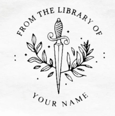 Custom Book Embosser by ChicCraft featuring a dagger and botanical design with 'From the Library of Your Name' text. Ideal for personalizing book pages.