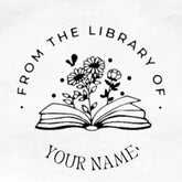 Custom book embosser design by ChicCraft featuring floral illustration over an open book with &